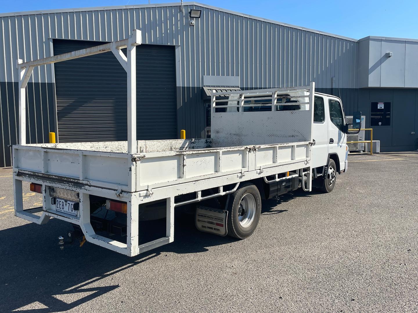 2018 FUSO CANTER 515 DC TRAYTOP WITH DROPSIDES AND REAR HURDLE