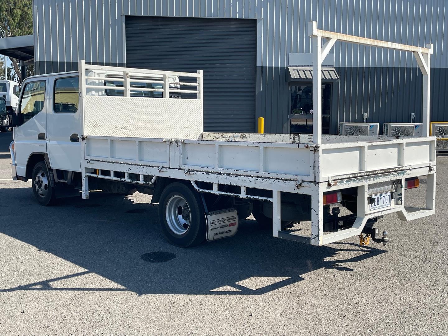 2018 FUSO CANTER 515 DC TRAYTOP WITH DROPSIDES AND REAR HURDLE
