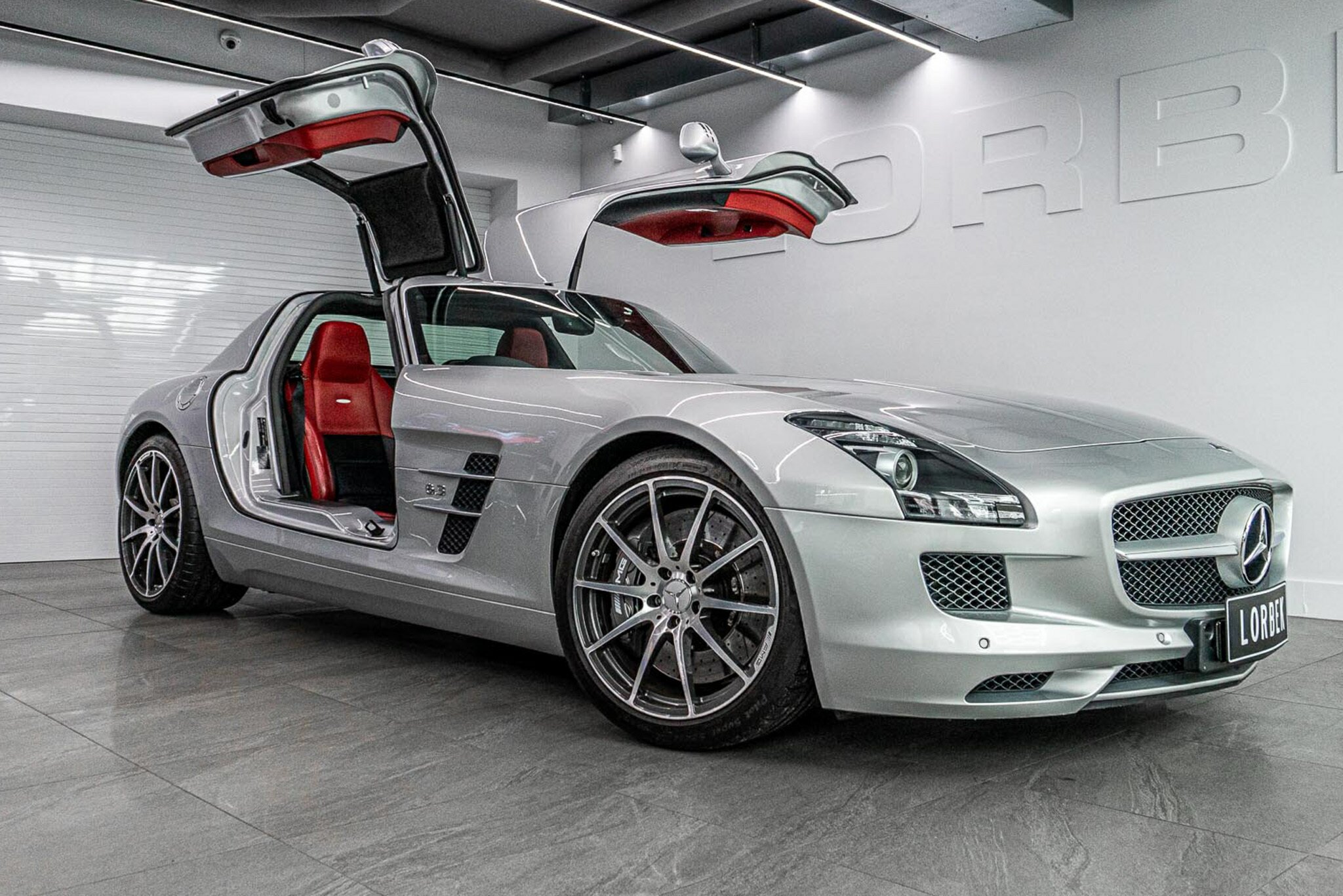 2010 mercedes-benz sls 197 amg 7 sp auto direct shift 2d coupe